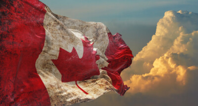 Retro,Flag,Of,Canada,With,Grunge,Texture,Waving,In,The