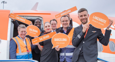 Business Development Director Nigel Mayes and CEO Jude Winstanley celebrate the three new routes – Barcelona, Salzburg and Arrecife – that easyJet will launch in W25 with some of the airline’s crew. The LCC will offer 20 destinations from its three-aircraft base in 2025.
